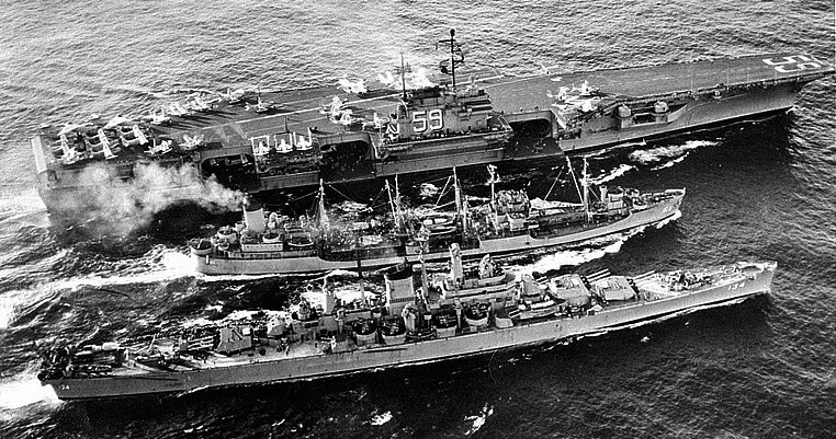 USS Severn (AO-61) refuels USS Forrestal and_USS Des Moines (CA-134) in the Atlantic Ocean, 11 November 1956