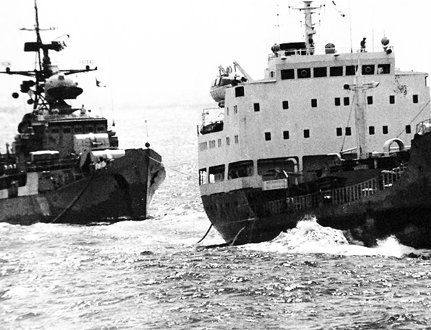 Riga class escorting a supply ship