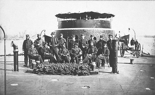 Officers posing in front of the turret