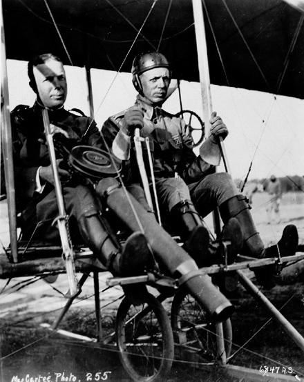 First use of a machine gun in flight