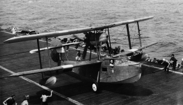 Walrus piloted by Lt AS Lawrence lands on deck