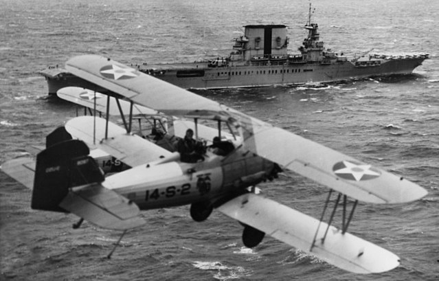 O2U-2 Corsairs of VS-14M fly over USS Saratoga