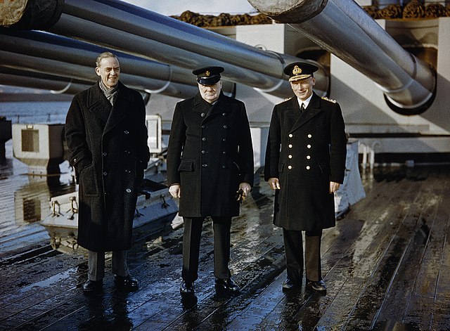 Winston_Churchill_with_the_Lord_Privy_Seal_Sir_Stafford_Cripps_CiC_Home_Fleet_Admiral_Sir_John_Tovey_quarterdeck_KGV_Scapa_Flow_11_October_1942