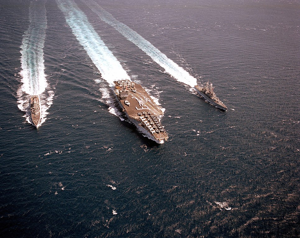 USS Enterprise, USS Truxtun, USS Arkansas underway in the Pacific Ocean on 17 September 1986