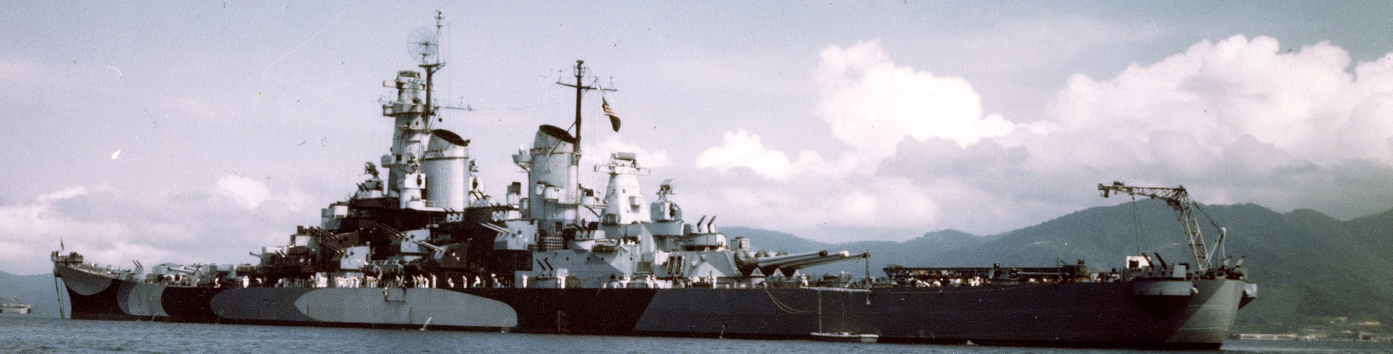 Size comparison of the battleship USS Missouri (BB-63) moored near