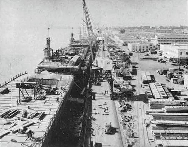 Escort carriers fitting out at Kaiser Shipyards circa April 1944
