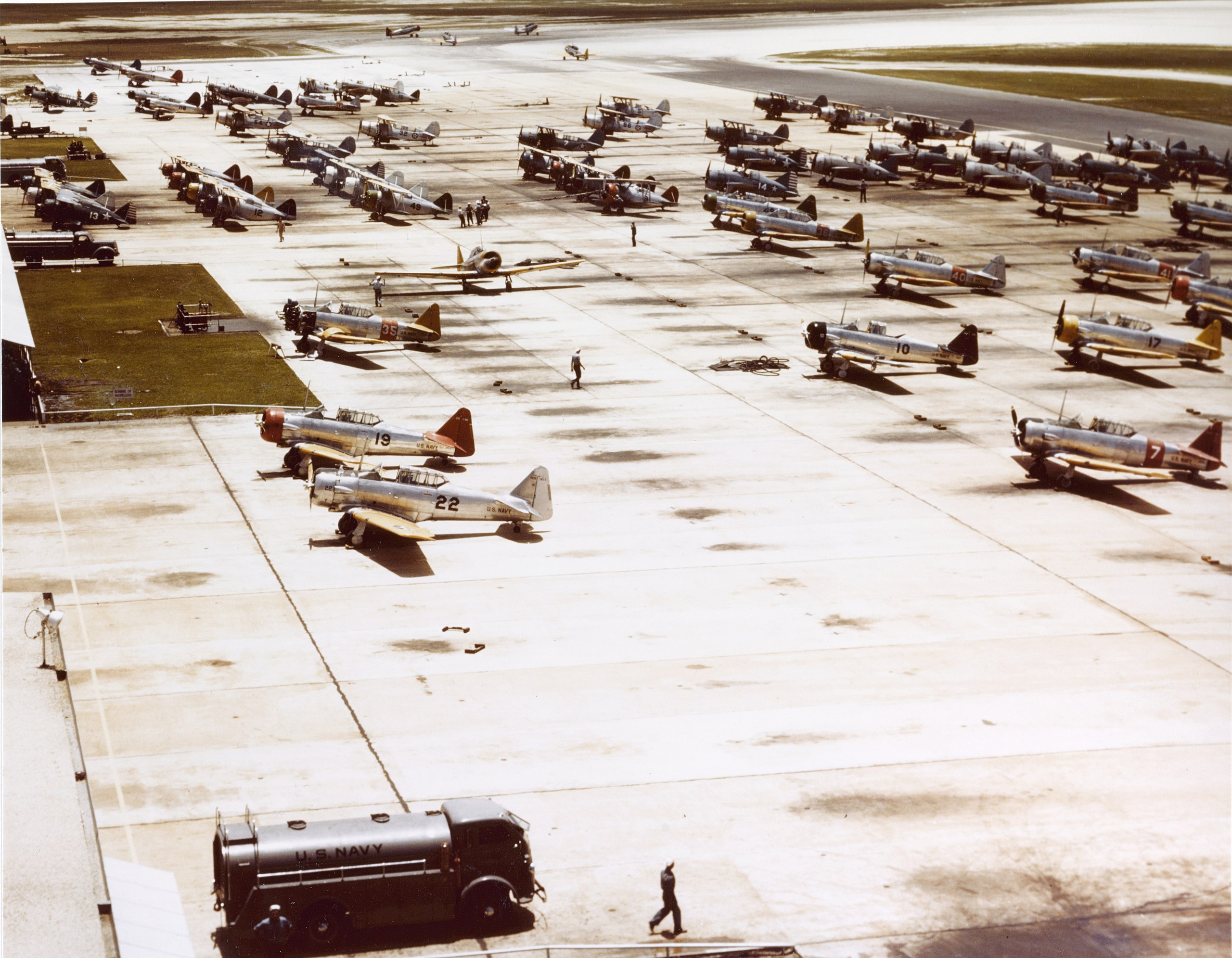 Various models a NAS Miami in 1942, with several SBCs in the background