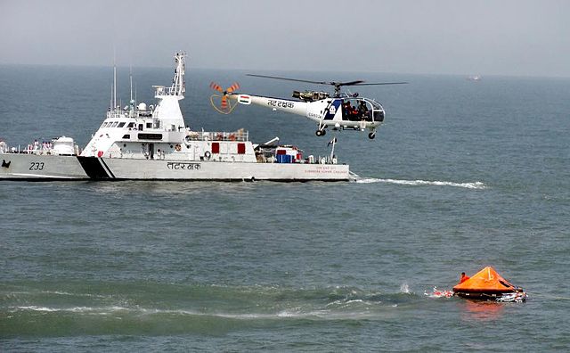 ICG Chetak picking up survivors during a mock drill ar SAREX 2014