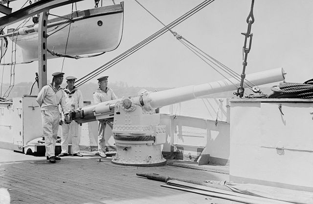 Forward view of the shielded deck guns, SMS Bremen off Hampton Roads