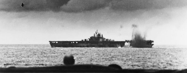 USS Bunker Hill, near-missed by a Japanese bomb Battle of the Philippine Sea, 19 June 1944